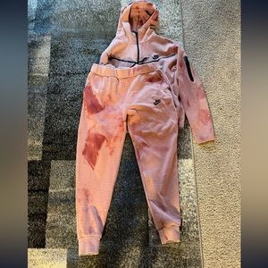 Pink red Nike tech suit